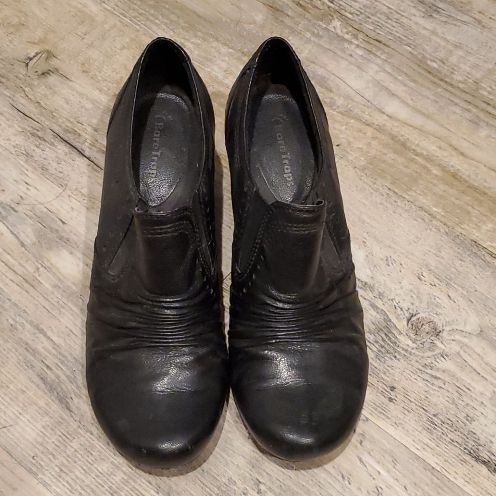 Black leather Bare Traps